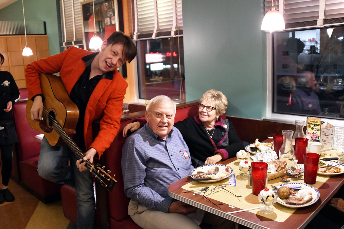 037 Dr. Roger and Betty Meyer are serenaded at dinner at the Uptown Cafe on their 3rd anniversary.jpg